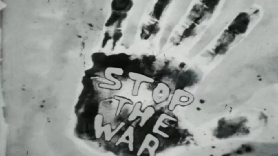 affiche la sixieme face du pentagone_Hand mit Stop the war Schriftzug